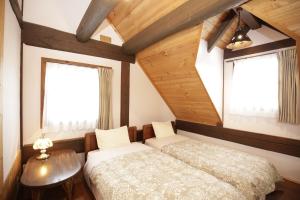 Кровать или кровати в номере Kogen no Kashi Besso Kurumi Terrace - Vacation STAY 56123v