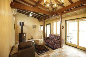 Гостиная зона в Kogen no Kashi Besso Kurumi Terrace - Vacation STAY 56123v