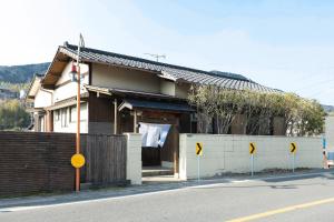a house on the side of a street at The minpark - Vacation STAY 14641 in Dazaifu