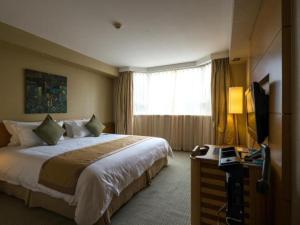 Et tv og/eller underholdning på Jinglun Hotel