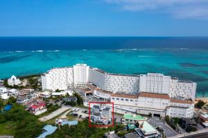 an aerial view of a hotel near the ocean at New Life Mansion 101 - Vacation STAY 57160v in Fuzuchi