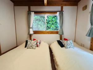 Un pat sau paturi într-o cameră la Private Villa - Vacation STAY 36268v