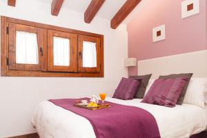 Cama o camas de una habitación en A Cantaruxa Maruxa Turismo Rural