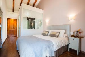 Cama o camas de una habitación en A Cantaruxa Maruxa Turismo Rural
