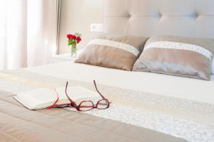 Cama o camas de una habitación en A Cantaruxa Maruxa Turismo Rural