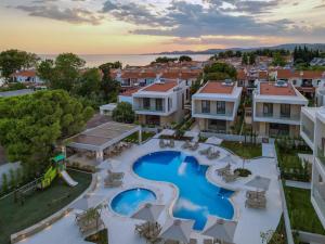 an aerial view of a resort with a swimming pool at RAFARKO Luxury Villa Nikiti Chalkidiki in Nikiti