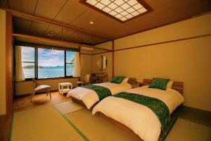 Katil atau katil-katil dalam bilik di VILLA Qinglu - Vacation STAY 62076v