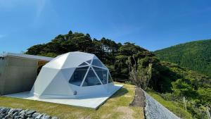 Nespecifikovaný výhled na hory nebo výhled na hory při pohledu z luxury tent + 1 fotografie