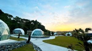 a view of two domes in a park with trees at amazing view room 2 - Vacation STAY 66289v in Kushima