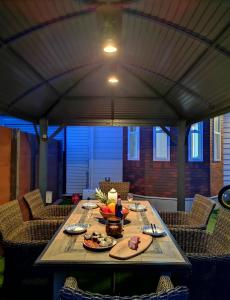 a table with plates of food on top of it at Ocean Resort Tateyama A House - Vacation STAY 73416v in Tateyama