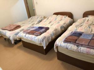 Postel nebo postele na pokoji v ubytování Hakodate station 5minutes - Vacation STAY 80839v