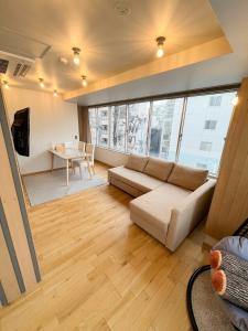 a living room with a couch and a table at YUZUKI - Vacation STAY 92921v in Takamatsu