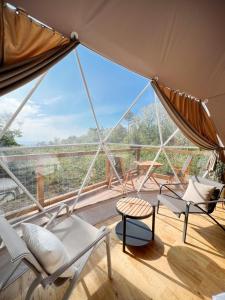 a room with chairs and a large window at KnotDaisen - Vacation STAY 98739v in Daisen +6 photos