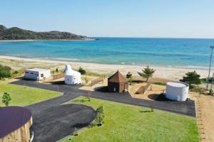 a view of a beach with buildings and the ocean at HV hygge setouchi - Vacation STAY 09914v in Yamaguchi