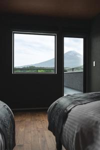 Ένα ή περισσότερα κρεβάτια σε δωμάτιο στο Alivio Building C - Vacation STAY 13963v