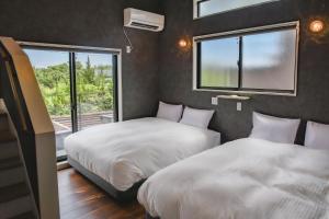 Giường trong phòng chung tại Retreat Villa Aym - Vacation STAY 18153v +47 ảnh