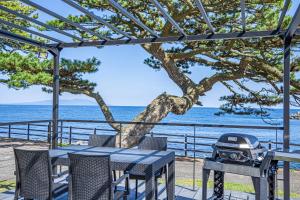 a picnic table with a grill on the beach at La-gum - Vacation STAY 42361v in Inatori