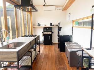 a kitchen with a sink and a stove at HOLE37 - Vacation STAY 42189v in Hōjō