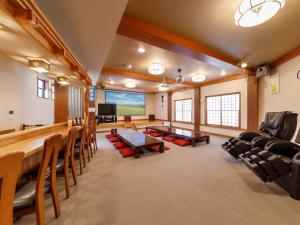 a large room with a conference room with a table and chairs at Oyado Asaka - Vacation STAY 29443v in Ena