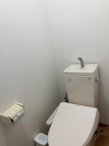 a bathroom with a white toilet with a sink at Maison dEssence - Vacation STAY 52767v in Izu +10 photos