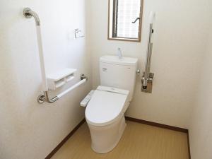 a bathroom with a white toilet in a stall at Hisetsu no Taki Campsite - Camp - Vacation STAY 42072v in Ōzato