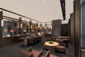 Atour Hotel Long'an Lake Linping في هانغتشو: تصور لمطعم مع طاولات وكراسي