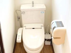 a bathroom with a white toilet with a sink at Lit Amakusa - Vacation STAY 78653v in Amakusa