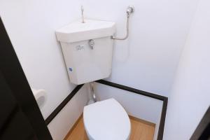 a bathroom with a white toilet and a sink at green park heights - Vacation STAY 15686 in Musashino