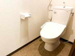 a bathroom with a white toilet in a stall at Hakodatekan - Vacation STAY 07877v in Hakodate +13 photos