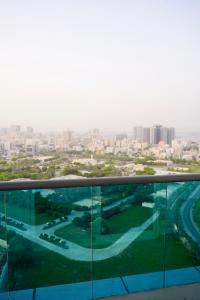 a view of the city from the top of a building at Brand New 2 Bed Rooms , High-end Finishing in Ajman 