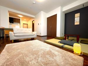 En eller flere senge i et værelse på Hakodatekan - Vacation STAY 07882v