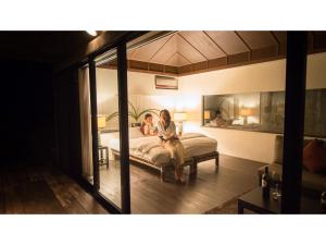 Giường trong phòng chung tại Mukaka Villa Kourijima - Vacation STAY 13078v
