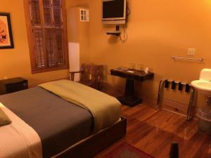 Et tv og/eller underholdning på Hotel Frederick + 238 billeder