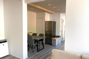 a kitchen and dining room with a table and chairs at Yamaga City - Camp - Vacation STAY 42290v in Kurize
