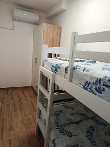 a bedroom with two bunk beds in a room at Aura Trebinje 2 in Trebinje
