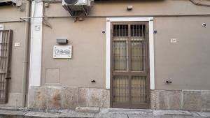 a door on the side of a building at Argentium Rooms in Arienzo San Felice