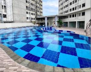 Bazén v ubytování Baloi Apartement nebo v jeho okolí