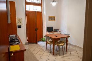 TV a/nebo společenská místnost v ubytování Appartamento G&G + 24 fotografií