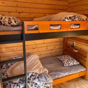 two bunk beds in a log cabin at Biwako Hills - Vacation STAY 27838v in Takashima