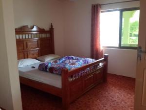 Postel nebo postele na pokoji v ubytování Taj Mahal International Guest House
