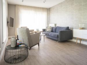 Χώρος καθιστικού στο Apartment in tasteful farmhouse in De Cocksdorp, on the Wadden island of Texel