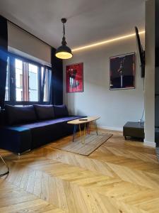 Ruang duduk di VipWarsawApartments pl Browary Warszawskie