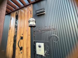 a door with a light on the side of a building at Populasunupuri - Vacation STAY 62945v in Otaru