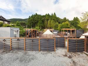 a house being constructed with a lot of wood at Ashigarashimogun - Glamping - Vacation STAY 75747v in Sengokuhara +8 photos