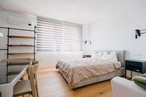 Ένα ή περισσότερα κρεβάτια σε δωμάτιο στο Le Calendule +7 φωτογραφίες