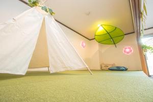a room with a tent in the corner of a room at Gokushocho Building 3A - Vacation STAY 00195v in Fukuoka