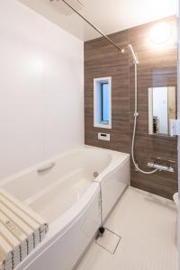 Ένα μπάνιο στο ecru sumiyoshi logement 1 - Vacation STAY 00298v