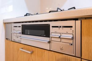 Η κουζίνα ή μικρή κουζίνα στο ecru sumiyoshi logement 2 - Vacation STAY 00280v