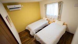 Postel nebo postele na pokoji v ubytování BLUE SOLARE 2 - Vacation STAY 14648v