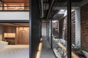 Postel nebo postele na pokoji v ubytování 德旅店 Dehostel